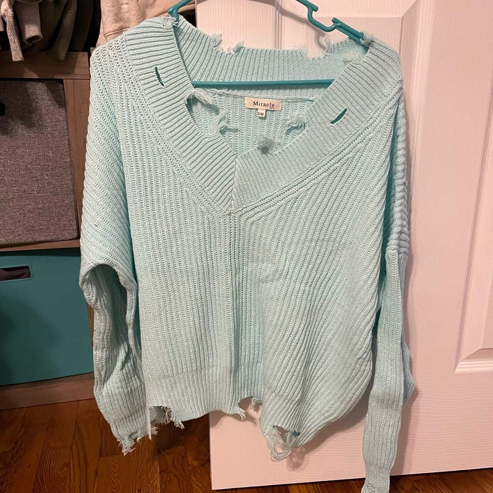 Distressed sweater